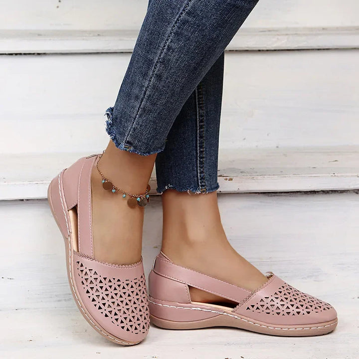 Slip-on wedge sandals.