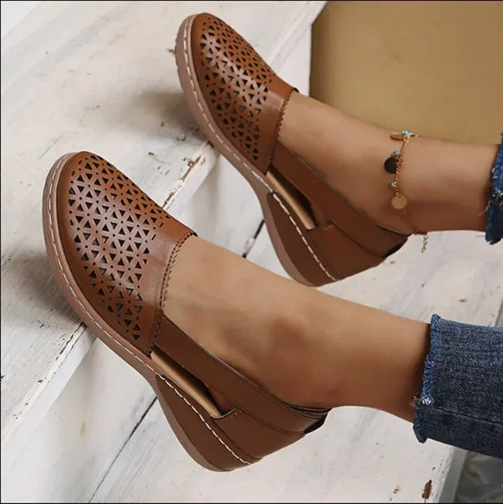 Slip-on wedge sandals.