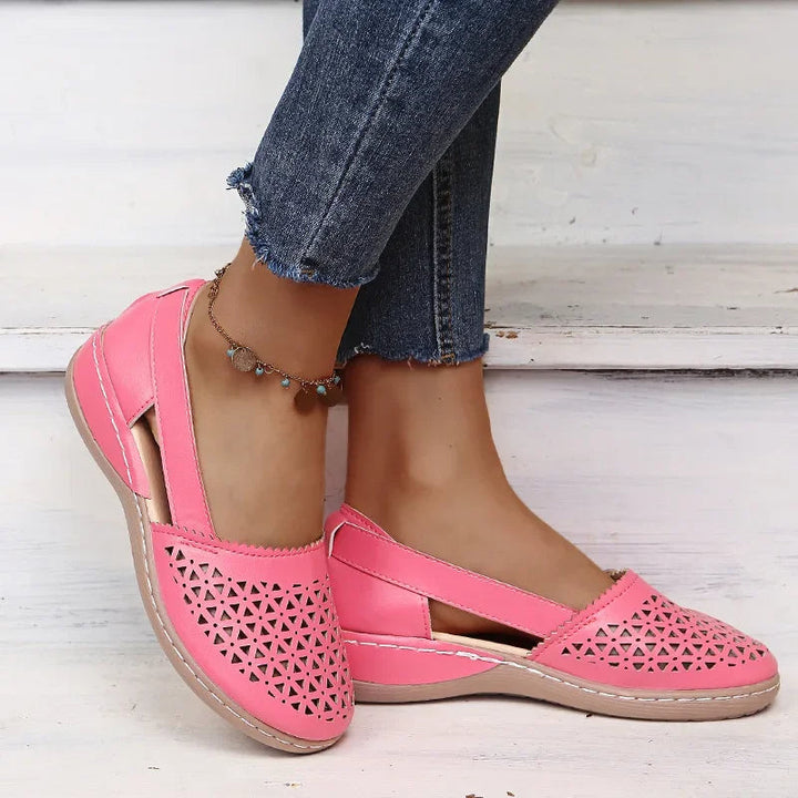 Slip-on wedge sandals.