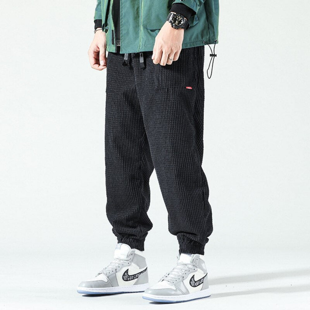 https://cdn.shopify.com/s/files/1/0816/6424/5953/files/Mens-Corduroy-Pants-with-Drawstring-Pockets-Jogger-2.jpg?v=1777557936