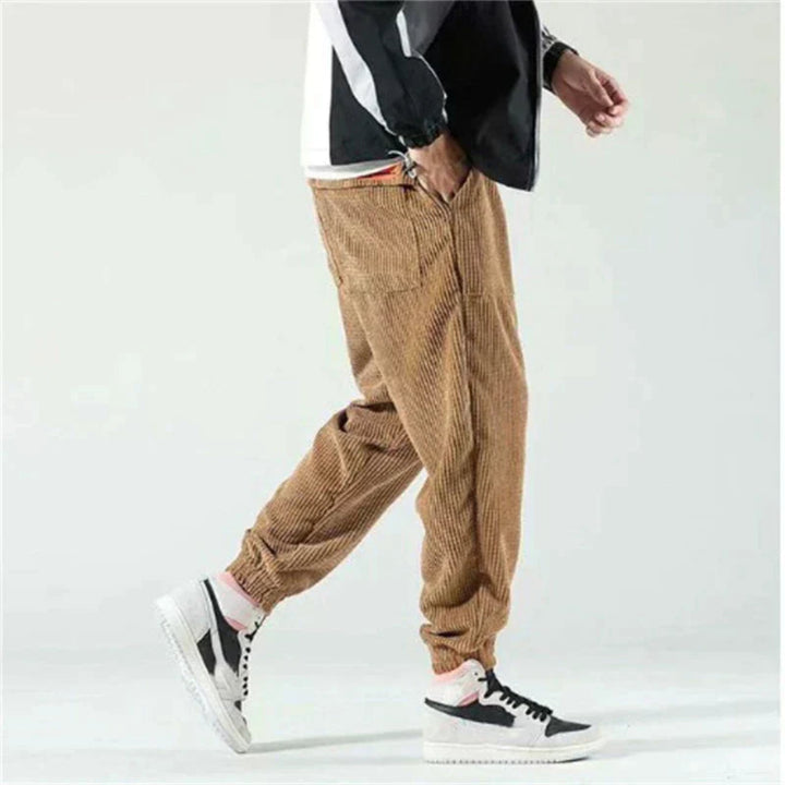 https://cdn.shopify.com/s/files/1/0816/6424/5953/files/Mens-Corduroy-Pants-with-Drawstring-Pockets-Jogger-4.webp?v=1777557939