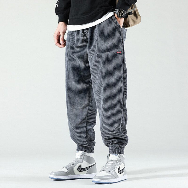 https://cdn.shopify.com/s/files/1/0816/6424/5953/files/Mens-Corduroy-Pants-with-Drawstring-Pockets-Jogger.jpg?v=1777557934